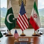 alt="US and Iran flags side by side representing diplomatic talks"